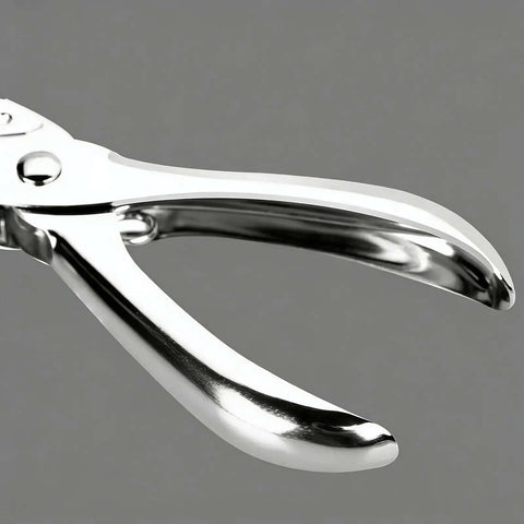 Close-up of Two Pack Single Hole Puncher Metal Craft Hole Punch For Scrapbooking And Tickets 6 mm Hole Diameter handle