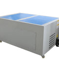 Straight Up Heavy Duty Metal Working Downdraft Table With Dual Drum Dust Collector And Welding Fume Extractor For Industrial Shop Grinding And Multi Stage Filtration 3KW 220V, showing the side view with casters.