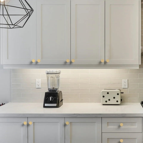 Champagne Bronze Knurled Cabinet Knobs 10 Pack for Cabinets and Drawers Kitchen Cupboard Dresser Hardware shown installed on white cabinets