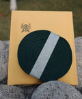 Durable Ito Sageo Wrapping Cord For Katana And Wakizashi 16.4 Foot Synthetic Silk on packaging outdoors on stones