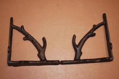Tree Branch Themed Shelf Brackets Set Of Six, two heavy duty rustic steel supports on a flat surface, forest style mounts