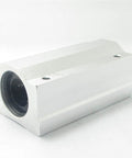 Aluminum linear bearing slide block with circular bore on left end, silver finish