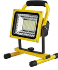 Spot Lighting Led Floodlight 500W 5000Lm Rechargeable Led Work Light in yellow with adjustable stand for outdoor use.