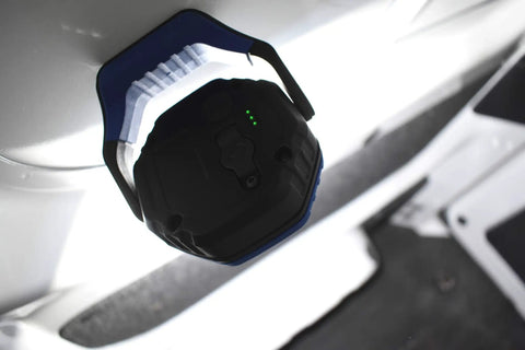 Palm Sized Super Bright Rechargeable Led Floodlight With Three Lumens Settings Durable Aluminum Build And Rotating Magnetic Base That Sticks Strong For Hands Free Work In Any Weather mounted on metal surface
