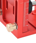 Close-up of red durable aluminum Pocket Hole Jig Kit For Woodworking With Precision Joint Angle Locator and measuring scale.