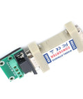 RS232 To RS485 Converter Adapter Dead Simple Serial Bridge For Industrial Automation with green connector and DB9 ports.