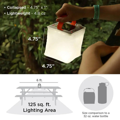 Solar Camping Lantern Inflatable LED Lamp Great For Camping Hiking Travel And Outdoor Adventures Waterproof IP67 held by a hand