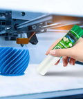 Six Pack 3D Printer Glue Sticks 1.27oz Each For Ultra Strong Bed Adhesion, shown with 3D printer and blue printed object