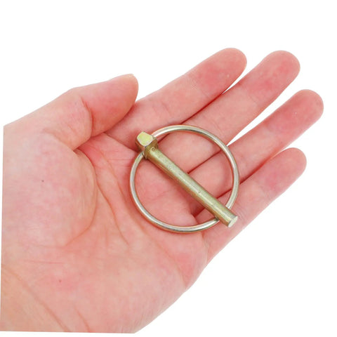 Heavy Duty Lynch Pin Assortment Kit For Trucks Trailers Mowers And Equipment With Spring Loaded Quick Disconnect Pins Self Locking Rings Durable Design For Secure Mounting, steel pin in hand