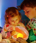 Children admiring a Seashell LED Mood Lamp, Portable Pearl Night Light, Ceramic Seashell Desk Ornament For Bedroom And Living Room