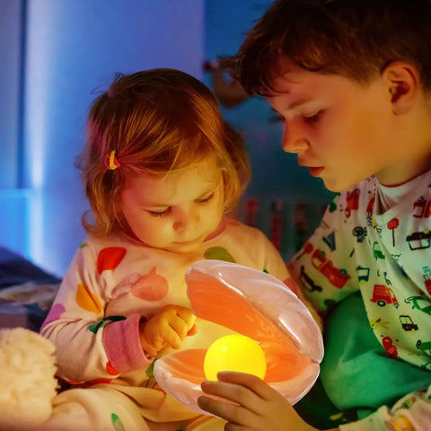 Children admiring a Seashell LED Mood Lamp, Portable Pearl Night Light, Ceramic Seashell Desk Ornament For Bedroom And Living Room