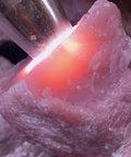 Natural Pink Opal Crystal Rough Specimen 1000g for Carving and Home Decor, illuminated by light to show texture and hue