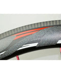 Close-up of a Carbon Road Bike Wheelset 40mm 50mm Clincher Tubeless Ready Rim 25mm Wide With Straight Pull Spokes Lightweight Aero Disc Wheels