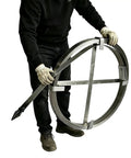Heavy Duty Manganese Steel Drain Snake To Bust Pesky Pipe Clogs And Tricky Sewer Backups Easy Manual Auger held by a person.