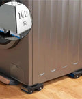 Heavy duty furniture lifters with protective pads under a washing machine for easy movement, part of 5-piece dolly mover set.