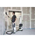 Person using PLANEX LHS 2 225 EQI Plus Drywall Sander With LED Ring Light Arm Friendly Adjustable Suction Power on drywall wall.