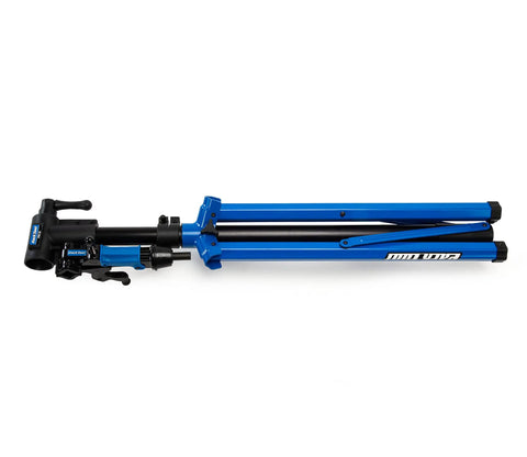 Folded lightweight bike repair stand for on the go pro grade adjustable clamp from 38 to 58 inches, stable tripod base.