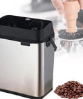 Premium Slick Silver Electric Espresso Portafilter Cleaner Paired With Solid Knock Box for easy cleaning and ground storage.