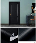 Dark Wood Peel And Stick Wallpaper For Countertops And Furniture Waterproof Vinyl Self Adhering DIY Friendly Removable Wall Covering Easy To Clean Realistic Hardwood Look For Kitchen Backsplash Cabinets And Walls 17.7 In By 118 In applied on door, close-up of texture and peel-and-stick feature