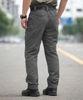 Back view of Men's Stretch Tactical Pants Waterproof Ripstop Cargo Pants For Hiking Work And Outdoor Adventures Built To Move Lightweight