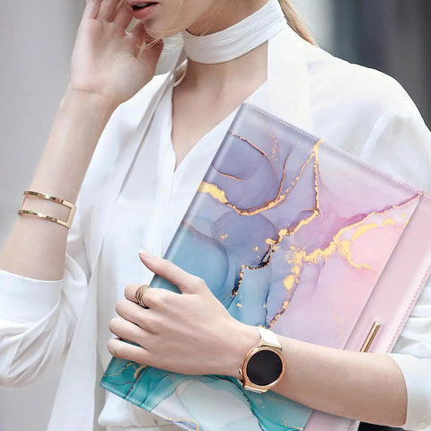Padfolio For Women And Men With Clipboard Boss Style Cute Chic Resume Portfolio Folder Conference And Legal Document Organizer A4 And Letter Size 4 Card Holders Document Sleeve Pen Loop Pink Blue Gold, held by a person wearing a white outfit.