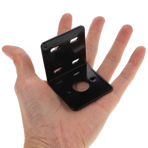 Heavy duty motor mounting bracket in hand, showcasing adjustable steel L-shape design with multiple fixed holes, ideal for 775 gear motors.