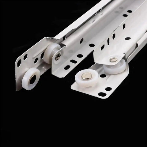 Close-up of Beefy Heavy Duty Keyboard Roller Slides for Cabinets and Desks with Full Extension Ball Bearing Rails on black background.