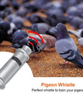 Stainless Steel Ultrasonic Pigeon Whistle With Lanyard For Bird Training and Pet Behavior Improvement near pigeons on ground.