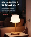 Outdoor Waterproof Shower Lamp Cordless 5200mAh Table Lamp With Touch Dimming IP65 Wireless LED Night Light on a table