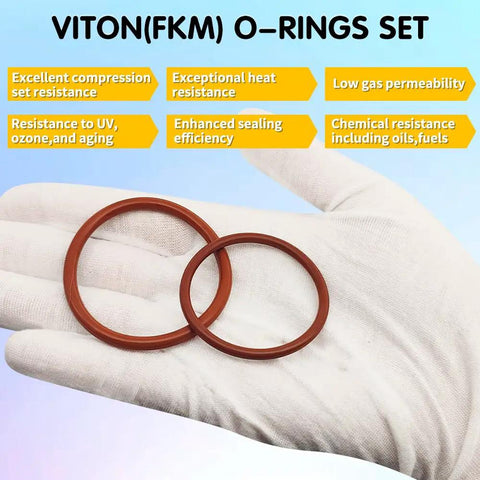 Close-up of two Viton O rings on glove, part of Viton O Ring Kit With 396 Pieces And 30 Sizes Metric O Rings Assortment 75A Durometer FKM Sealing Kit For Hydraulic Automotive Engine And Plumbing Repair Pro Grade Heavy Duty
