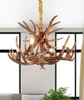 Rustic Antler Chandelier With Four Lights Small Deer Horn Pendant Lamp in resin candle style, dining room setting