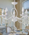 French Country Crystal Pendant Light With White K9 Crystals And Wrought Iron Frame E12 Candle Style Chandelier in dining room