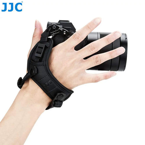 Person using Pro Mirrorless Camera Hand Grip Strap With Arca Type Plate on camera for secure hold and comfort