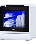 No Plumbing Headache Game Changer Countertop Dishwasher With Eight Knockout Clean Cycles, Slick Auto Dry Option, Timed Delay Feature, Child Proof Lock, And Compact Build Designed For Small Kitchens, Dorms, Rvs And Apartment Living, showcasing dishes inside a modern white design.