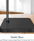 Base of 2 In 1 LED Floor Lamp With 3 Color Temperatures And Stepless Dimming, showcasing stable sand filling counterweight