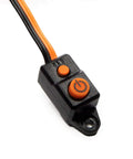 Close-up of Firma 85A Brushless Smart ESC And 3300Kv Sensorless Motor Combo power switch, black housing with orange buttons