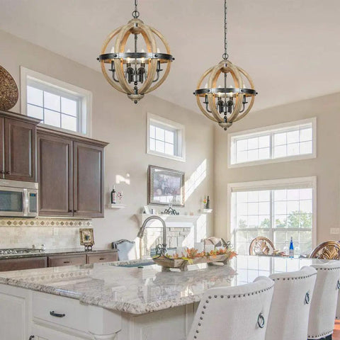 Orb Four Light Farmhouse Chandelier in Stardust Brown with wood accents hanging over kitchen island, cozy rustic vibe
