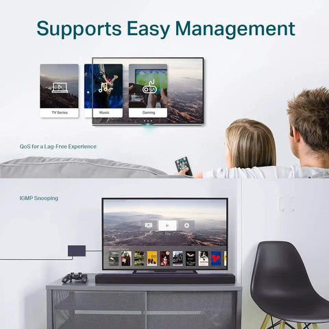 Couple using 8 Port Gigabit Ethernet Switch With No Fuss Setup And Easy Smart Management For Desktop Or Wall Mount, enjoying media