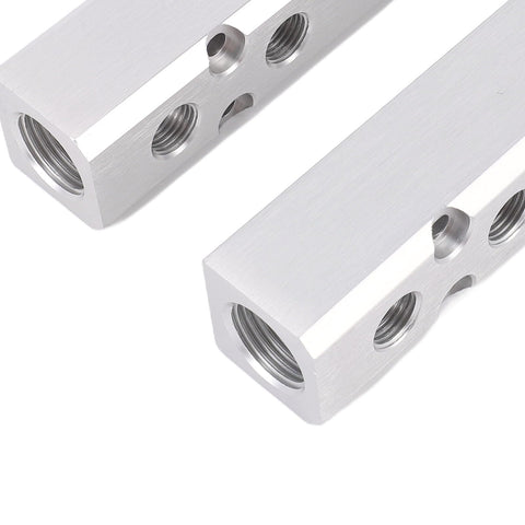 Close-up of Six Way Eight Port Air Compressor Manifold Block With 1/4 Inch NPT Output And 1/2 Inch NPT Supply Port For Pneumatic Systems