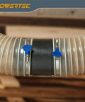 Hella Flexible 4 In By 5 Ft PVC Dust Collection Hose with stainless clamps, clear tube, connecting to woodshop equipment.