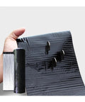 Heavy Duty Asphalt Roof Repair Tape For Sneaky Leaks And Narrow Cracks Waterproof Aluminum Flashing Roll in hand, showcasing material.