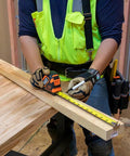 Heavy Duty Tape Measure With 30 Foot Double Hook, Double Sided Nylon Reinforced Blade, 13 Foot Standout in use on construction site