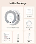Six Pack Wireless Interconnected Smoke And Carbon Monoxide Detectors Featuring Ten Year Sealed Battery For Battle Ready Home Security And Straight Up Worry Free Peace Of Mind components including alarms, manual, brackets, screws, and plugs.