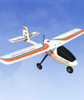 Trainer Edition RC Flight Simulator With SLT6 Controller RFL1211 plane model in flight against blue sky background