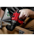 Close-up of 12V Brushless Cordless Drill Driver Combo 4 In 1 Hammer Drill With Right Angle Head in use on wood.