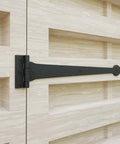 Wrought Iron Heart Style Strap Hinges 18 Inch Heavy Duty Pack Of 4 with hardware installed on a wooden gate, rustic black powder-coated finish