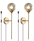 Dope Mid Century Smoke Glass Plug In Wall Lights Two Piece Brushed Brass Globe Sconce Lamps Two In One Hardwired Or Plug In Industrial Style For Bathrooms And Hallways Smoke Gray Finish in brass with plugs visible