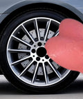 Glow In The Dark Valve Stem Caps 4 Pack Prank Gift For Cars Bikes And Motorcycles Dope Pink Glowing Tire Caps next to car wheel