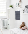 Double Sided Hanging Storage Organizer With Thirty Pockets For Socks Underwear And Clothes Dorm Room Door Wall Mount near bed.