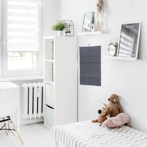 Double Sided Hanging Storage Organizer With Thirty Pockets For Socks Underwear And Clothes Dorm Room Door Wall Mount near bed.